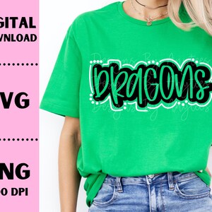 May include: A green t-shirt with the word "DRAGONS" written in black and green lettering with white outlines.
