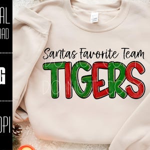PNG della squadra preferita di Babbo Natale, PNG di Natale, PNG delle Tigri, Idea per la maglietta delle Tigri, Design per sublimazione delle Tigri, PNG della mascotte, PNG della mascotte di Natale