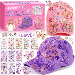 May include: A DIY craft kit featuring a pink box labelled ENCOUN DESIGN GOUR OWN BASEBAT CAL, containing sheets of adhesive gems and two baseball caps, one pink and one purple, both decorated with colourful, sparkling jewel stickers in various shapes.