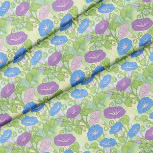 May include: A fabric pattern featuring a repeating botanical print of morning glory flowers in shades of purple, light blue, and pale pink. The flowers are connected by thin, dark green vines and leaves set against a soft, light green background.