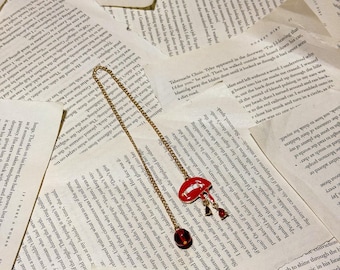 Kettingbladwijzer met op vampier en romantiek geïnspireerde bedels