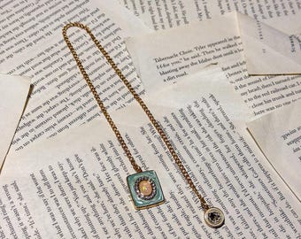 Kettingbladwijzer met regency/vintage geïnspireerde bedels