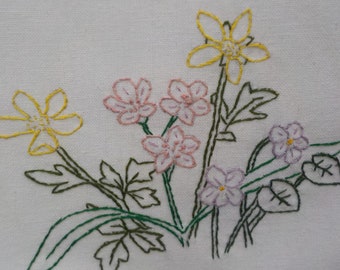 Hand embroidered spring wildflower tea towel