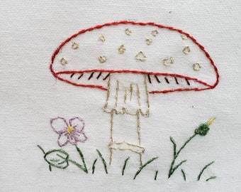 Hand embroidered Amanita Mushroom and Wildflower Tea Towel