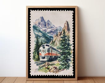 May include: A framed print featuring a vintage train traveling through a mountain landscape. The train is white and orange, set against a backdrop of snow-capped mountains, green trees, and rocky terrain. The print has a postage stamp design.