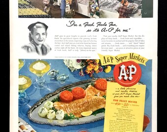 May include: Vintage A&P Super Markets advertisement. The image features a woman's portrait, a fish fillet dinner, and a bustling grocery store scene. Text includes "I'm a Fresh Foods Fan, so it's A&P for me."