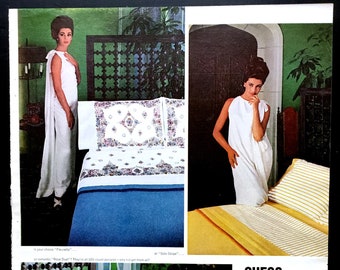 May include: Vintage advertisement featuring bedding sets with floral and geometric patterns. The ad includes a woman in a white dress posing near the beds. The text "GUESS HOW MUCH?" is visible, along with product details.