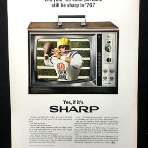 May include: A vintage Sharp color portable television advertisement featuring a football player on the screen with the text '1976 SUPER BOWL'. The ad asks 'Will your '69 color portable still be sharp in '76?' and includes the brand name SHARP.