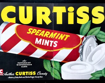 May include: A vintage advertisement for Curtiss Spearmint Mints. The ad features a red and white striped tube of mints with a green leaf design. The text "CURTISS SPEARMINT MINTS" is in yellow letters on a black background. The ad also mentions other flavors, including peppermint, wintergreen, and clove.