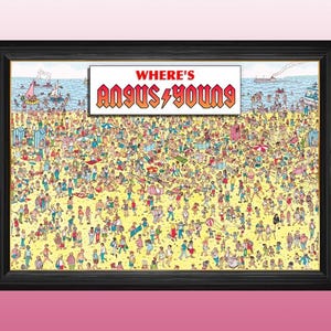 May include: A framed print of a "Where's Wally" style illustration with the title "Where's Angus Young" and a crowd of people on a beach. The title is in red and black with a lightning bolt.