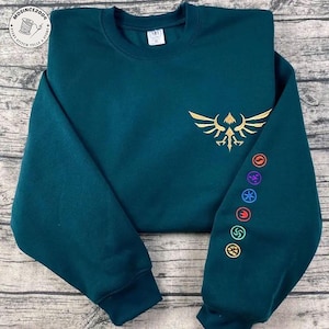 Embroidered Legend of Zelda Sweatshirt or Hoodie – Hylian Crest & Element Symbols, Breath of the Wild Inspired,Gamer Gift,Nintendo Fan Shirt