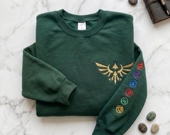 Embroidered Legend of Zelda Sweatshirt or Hoodie – Hylian Crest & Element Symbols, Breath of the Wild Inspired,Gamer Gift,Nintendo Fan Shirt