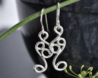 Silver swirl earrings, casual silver jewelry, everyday earrings, silver flourish earrings, fused argentium silver wire work swirly earrings