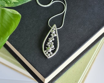 Seedpod teardrop necklace handmade in solid sterling silver by Canadian jewellery artist Melissa Pedersen. Unique .925 silver bubble pendant