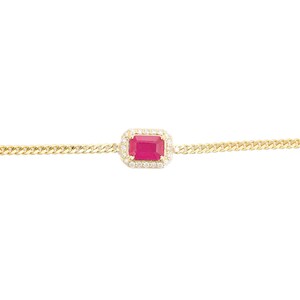 May include: A gold chain bracelet featuring a rectangular, vibrant red gemstone surrounded by small, clear stones. The bracelet has a classic curb chain design, and the gemstone is the focal point of the piece.