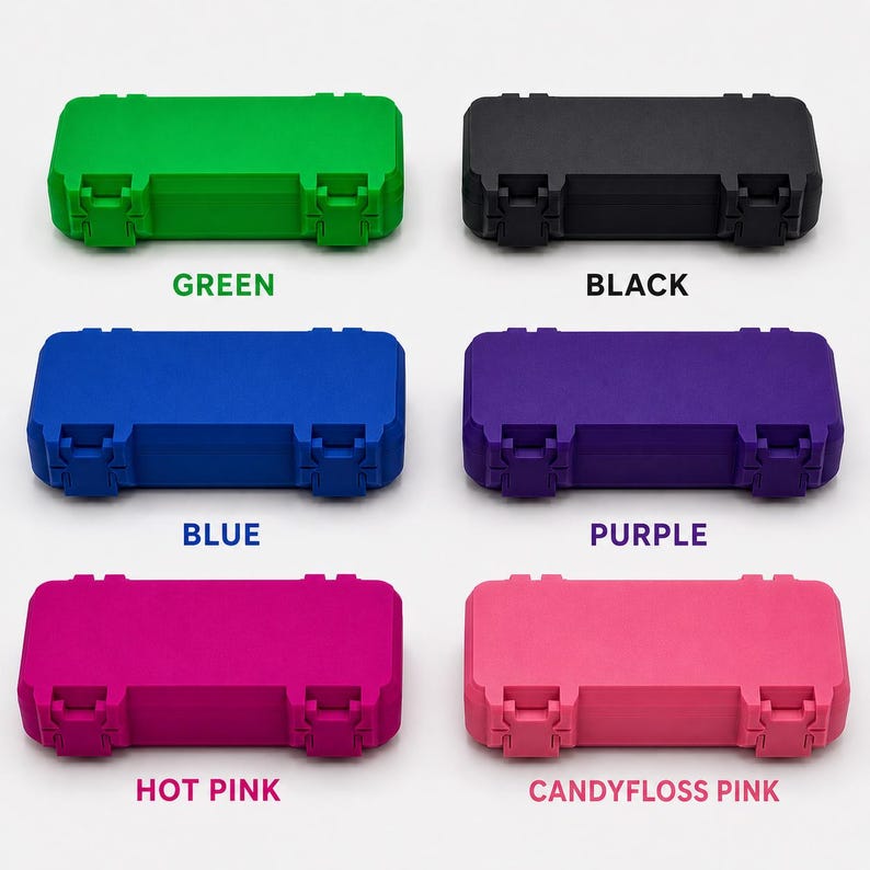 May include: A collection of six small, rectangular cases in various colors: green, black, blue, purple, hot pink, and candyfloss pink. Each case has two secure latches and the color name printed below.