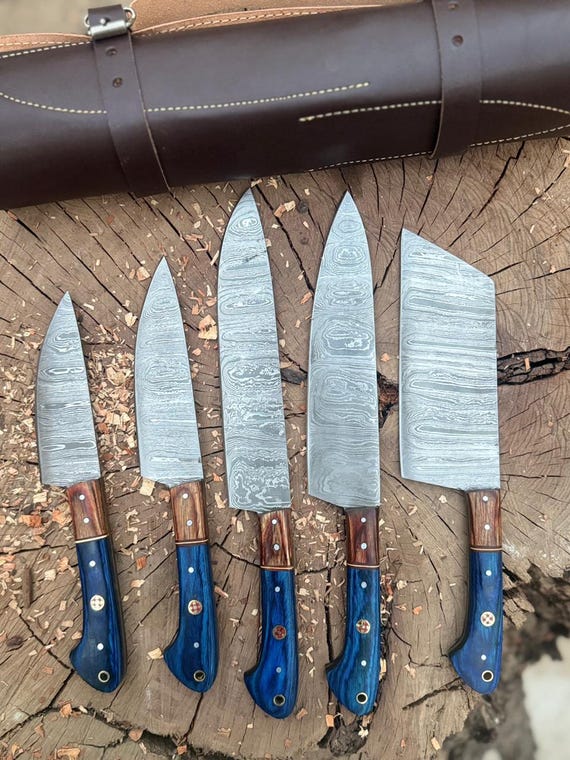 A matched artisan Damascus chef set with 49 favorites backing it — proof that real buyers are gifting this, not just browsing.