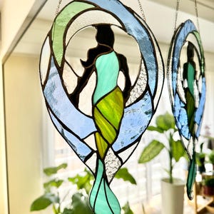 Stunning Stained Glass Mermaid with Flowing Tail and Ocean-Inspired Colors suncatcher Handcrafted Art for Nautical Home Decor or Unique Gift