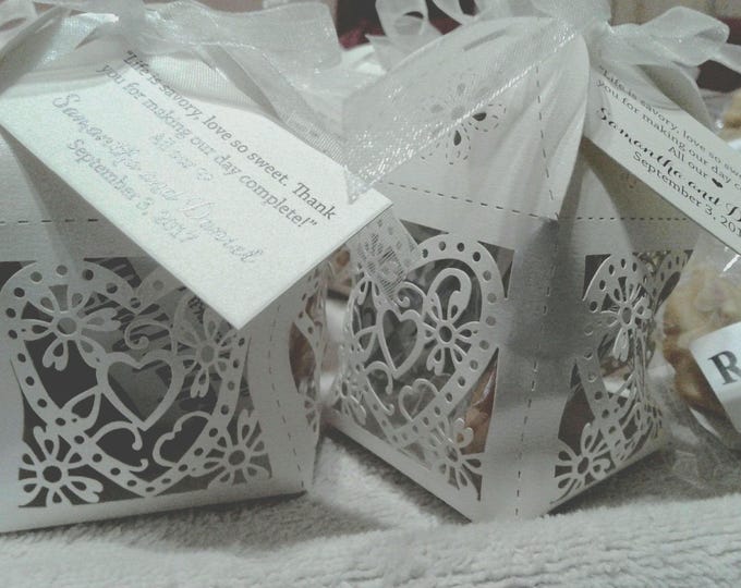 Featured listing image: Elegant Wedding Favors.  Taste of New Orleans Heart Box Favors Tied with Perfect Delight.  Your Guests Will Want More.  A Delicious Memory!