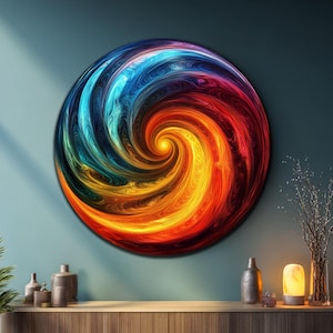 May include: A large, circular abstract artwork with a swirling vortex design. The artwork features a vibrant color palette, transitioning from blue to red and yellow at the center. The piece is mounted on a teal wall above a wooden cabinet.