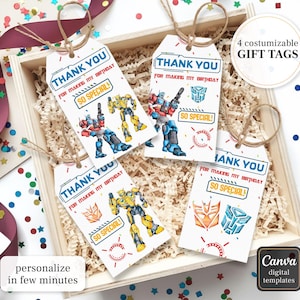 May include: Four customizable gift tags with a Transformers theme. Each tag features the text "THANK YOU FOR MAKING MY BIRTHDAY SO SPECIAL!" and illustrations of Transformers characters. The tags are in a wooden box.