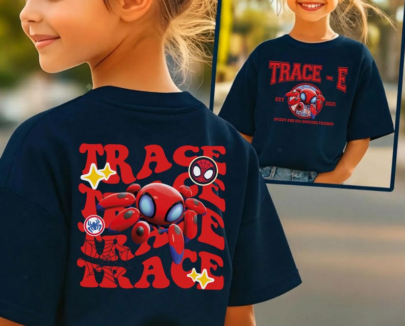 May include: Navy blue t-shirt featuring a red and blue cartoon spider design with the text "TRACE-E" and "Spider and his amazing friends". The shirt has a retro style design with a cartoon spider and star accents.
