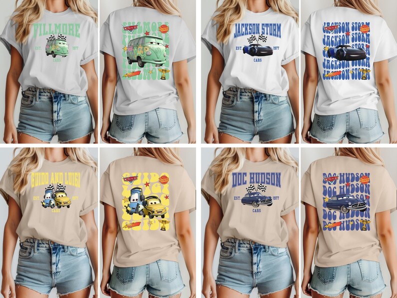 May include: Collection of t-shirts featuring various car-themed designs. The shirts display images of cartoon cars and text such as "VILLMORE", "JACKSON STORM", and "DOC HUDSON". The shirts are in various colors, including white and tan.