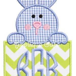 May include: A blue and white gingham bunny peeking over a green and white chevron monogrammed box. The monogram is in a circle and reads "KGR".