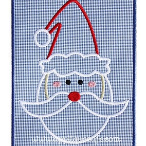 May include: Embroidered patch featuring a white Santa Claus face with a red hat and a white beard on a blue gingham background.