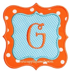 May include: Orange and white polka dot frame with a blue and white gingham inner frame. The letter "G" is embroidered in orange in the centre of the frame. The text "www.appliquecafe.com" is at the bottom of the frame.