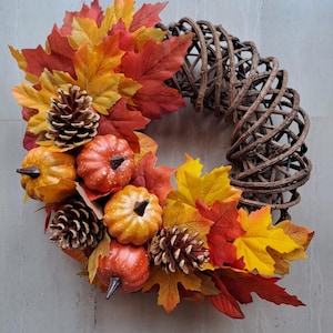 Handmade autumn wreath with 35x35 wicker base, perfect for doors, windows, fireplace or as a gift idea.