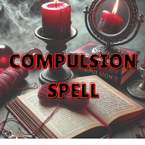 May include: A red candle burns in a black candlestick on a wooden table. A book with the title "Compulsion Spell" is open on the table. There are other candles, a mirror, and red yarn on the table.