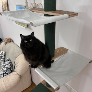 Modern Wooden Cat Tree Tower with 2 Comfortable Hammocks, Green Rope Scratching Posts, and Wide Shelves – Durable and Eco-Friendly Cat Furniture for Climbing, Scratching, and Lounging