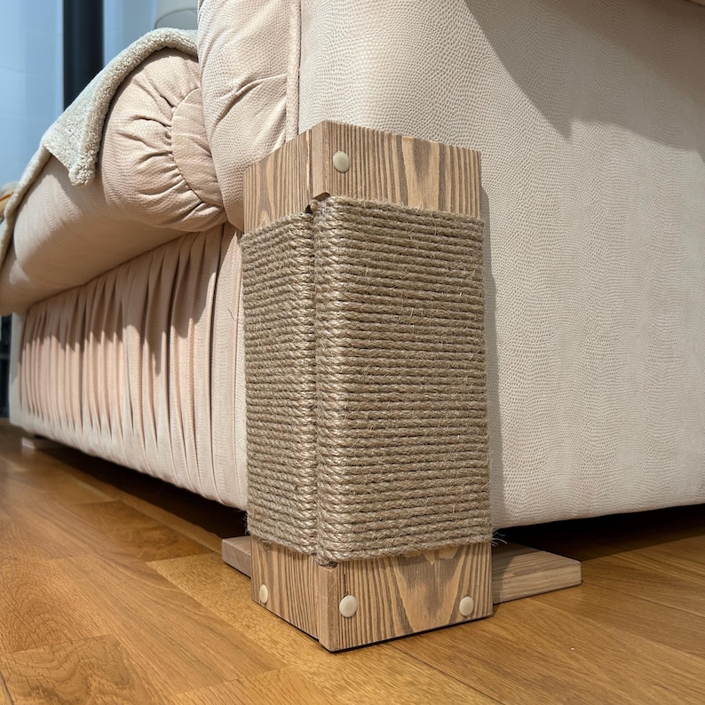 Brown cat scratcher with jute rope, furniture protector for cats, small corner scratching post, modern cat furniture, lightweight wood cat scratcher, pet couch protector, cat scratch post for sofas, durable cat scratching pole, cat lover gift