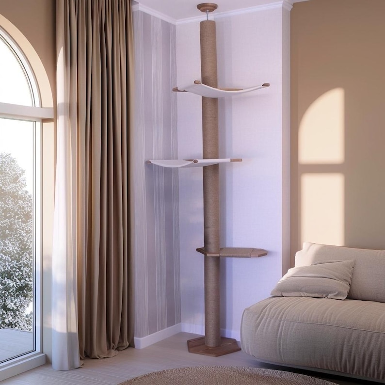May include: A tall cat tree with a central, rope-wrapped post and multiple platforms. Two white hammock-style beds and a wooden shelf provide lounging spots. The structure is made of wood and rope, designed for indoor use.