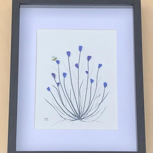 Blue sea glass flowers with a bumble bee wall hanging!