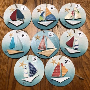 Sailboat, pottery, glass, sea glass ornament.