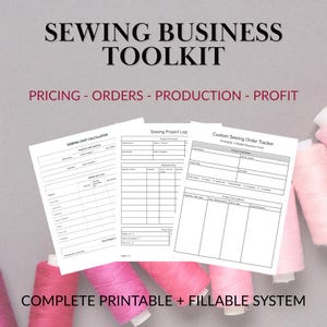 May include: A sewing business toolkit with the text "SEWING BUSINESS TOOLKIT" at the top. The image includes printable forms for pricing, orders, production, and profit. Pink thread spools are in the background. The text "COMPLETE PRINTABLE + FILLABLE SYSTEM" is at the bottom.