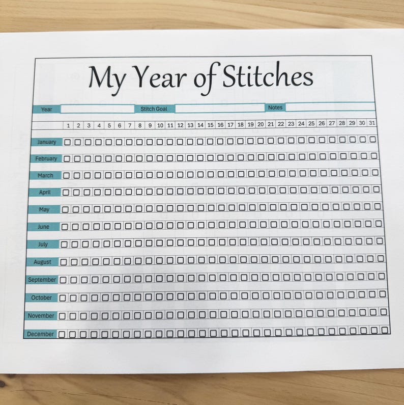 May include: A printable year-long stitching tracker with a teal header and black boxes for each day of the year. The header says "My Year of Stitches".
