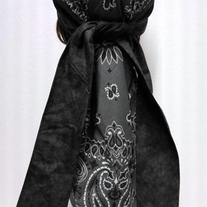 May include: A white ceramic mug with a black handle and the text "But First, Coffee" in a handwritten style. The mug is on a white surface. The mug is approximately 4 inches tall.