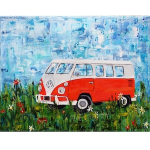 May include: A red and white vintage Volkswagen van parked in a field of green grass and wildflowers. The van has a white roof and a white stripe along the side. The van is surrounded by a variety of flowers, including red, white, and yellow flowers.