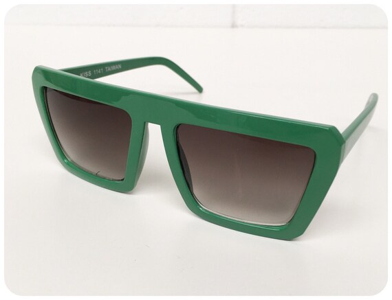 big green sunglasses