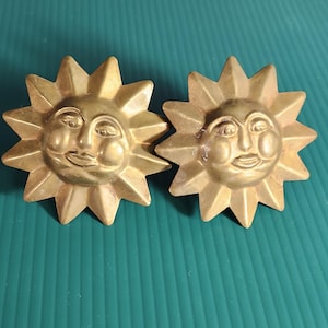 brass sunburst napkin rings