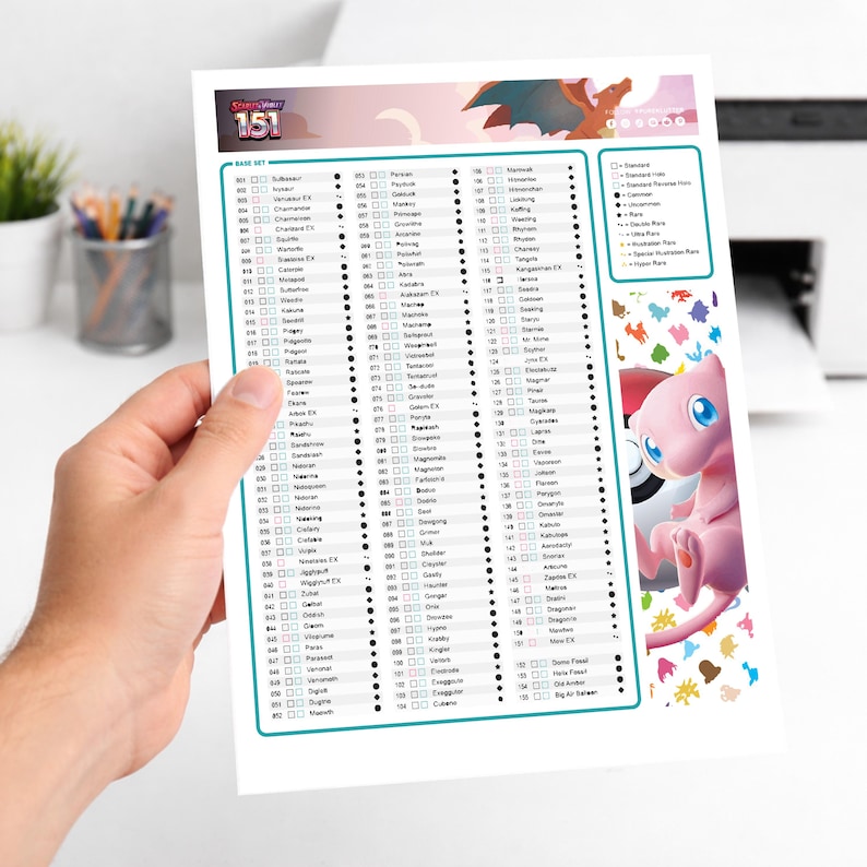 May include: A printed sheet featuring a checklist for a "Base Set" with the number "151" at the top. The sheet has a teal border and includes various checkboxes and character names. A pink cartoon character is visible on the right.