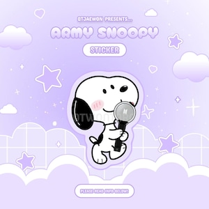 May include: A sticker featuring Snoopy in a cute pose, holding a black and silver object. The sticker has a light purple background with white clouds, stars, and the text "ARMY SNOOPY STICKER". The text "QTJAEWON PRESENTS..." is also visible.