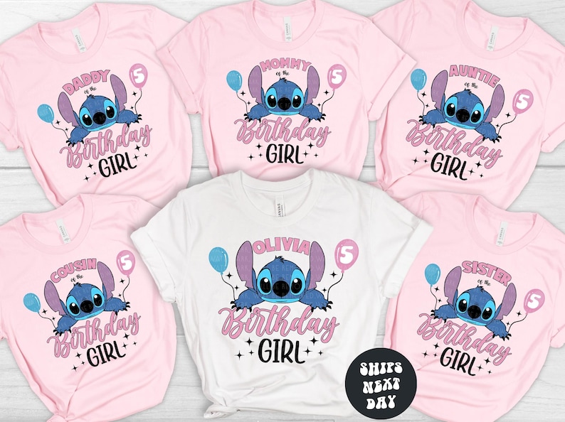 A collection of pink t-shirts with a cartoon character and text printed on them, likely representing a birthday theme.