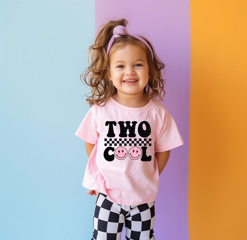 a little girl standing in front of a colorful wall