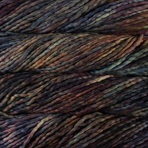 May include: Close-up of thick, textured yarn in shades of brown, purple, and blue. The yarn appears to be hand-dyed, with color variations creating a mottled effect. The strands are tightly twisted, suggesting a durable material suitable for knitting or crocheting projects.