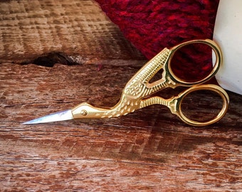 Stork scissors gold or silver 3.5”