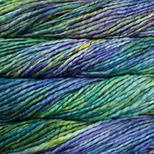 May include: Close-up of hand-dyed yarn in shades of blue, green, purple, and yellow. The yarn appears thick and textured, with variations in color throughout. Ideal for knitting, crocheting, or other fiber arts projects.